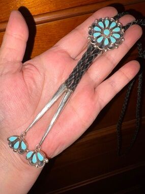 Turquoise Flower Bolo Tie with Braided Black Leather